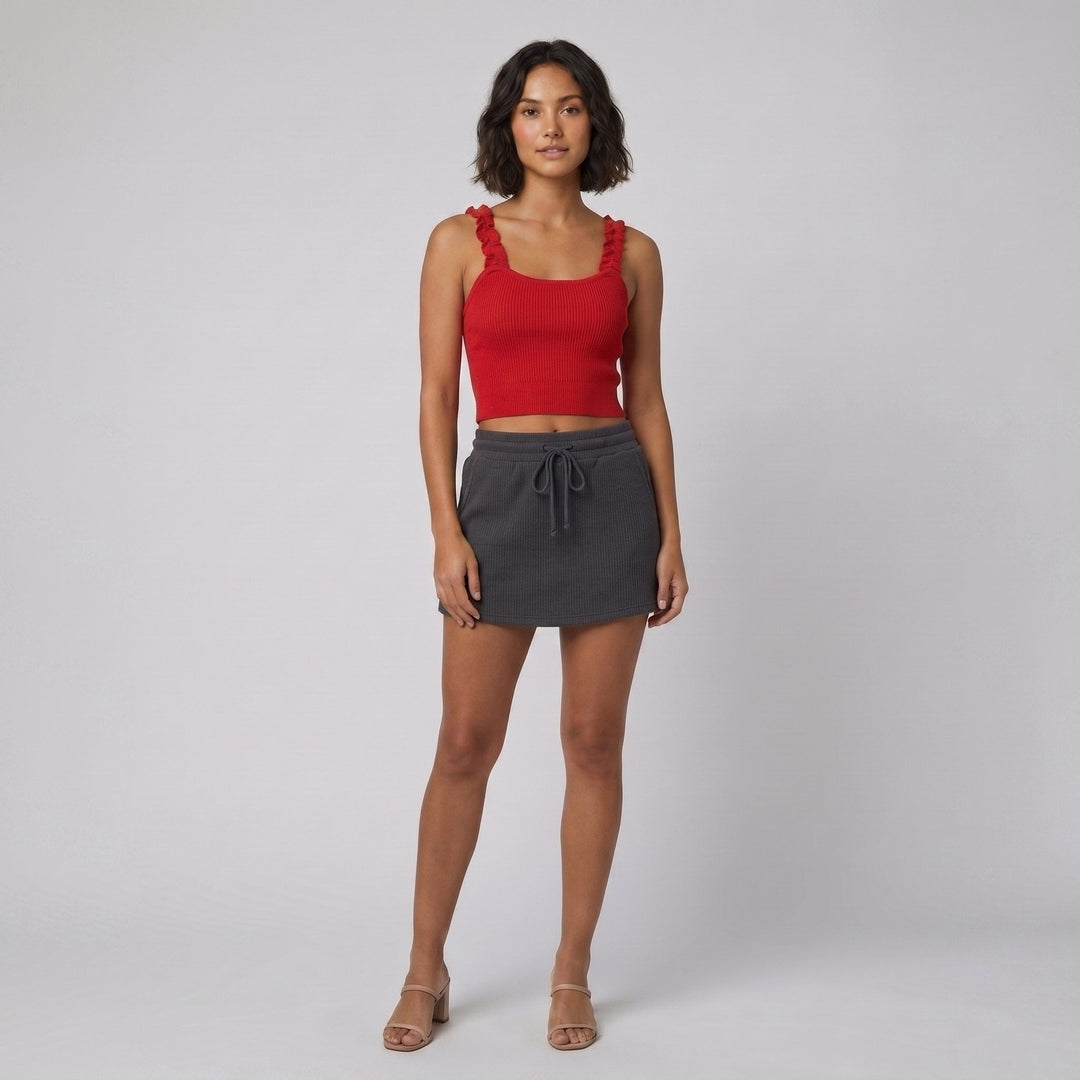 Coline red ribbed knit tank with charcoal drawstring skort, front view on model