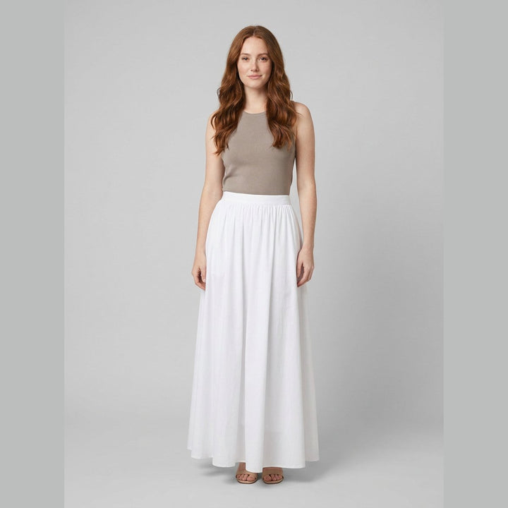 Cora white cotton maxi skirt, front view on model