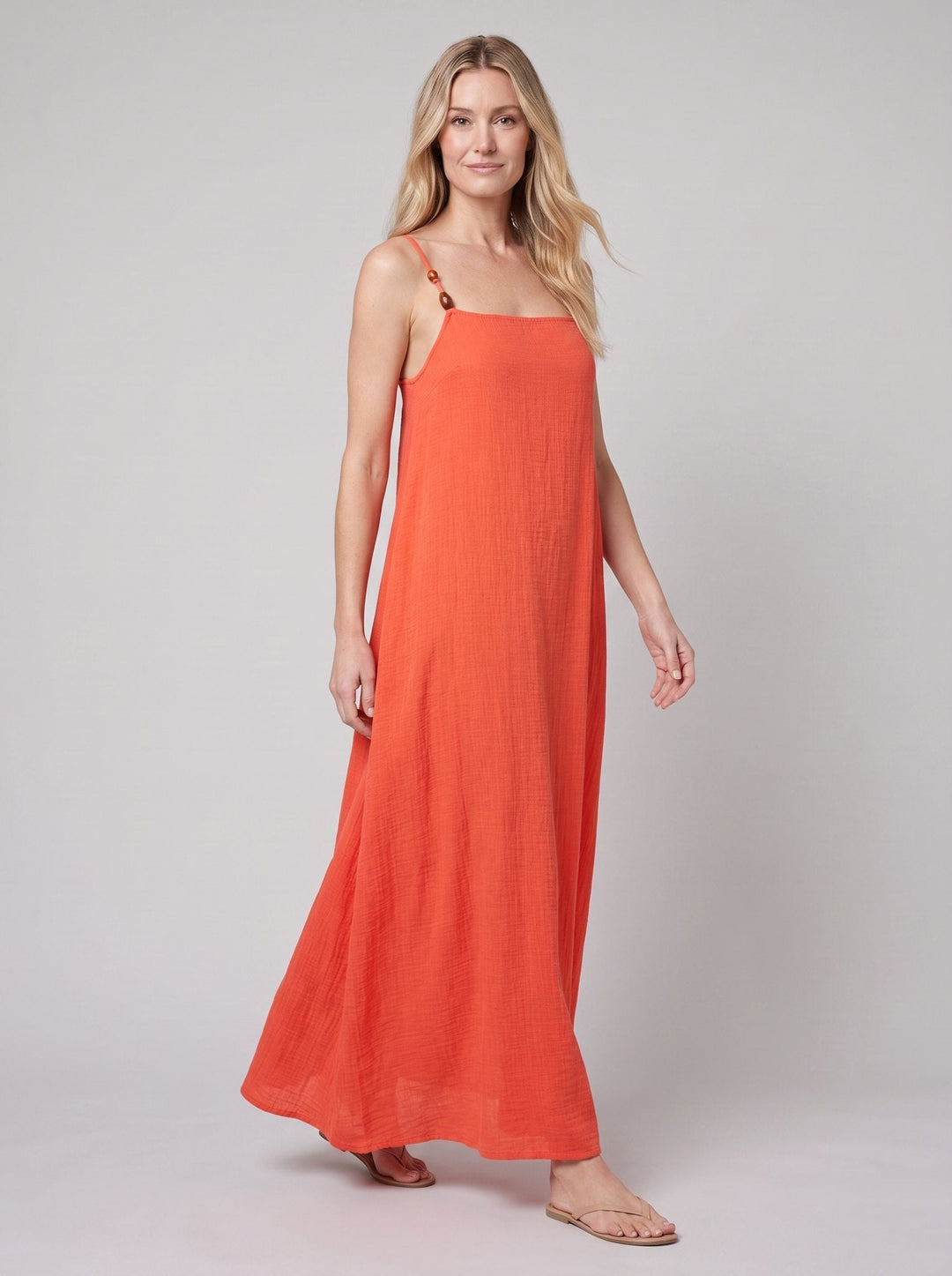 Flame beach cover-up, side view showing the adjustable straps