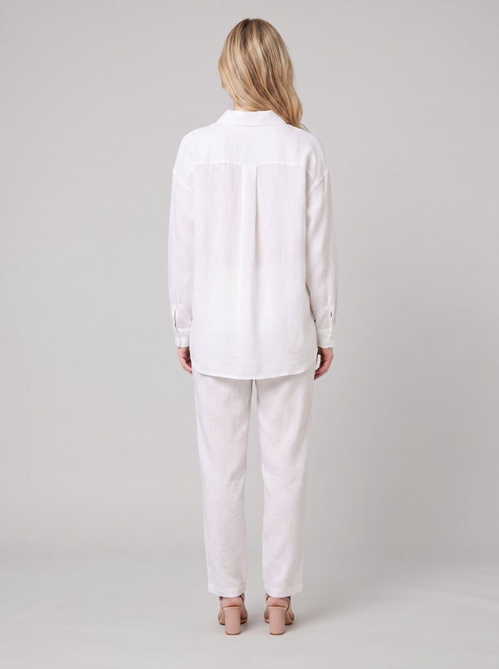 Dani white blouse back view on model