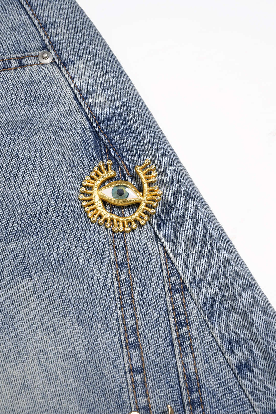 Dazzle wide leg jeans gold embroidery fabric close-up