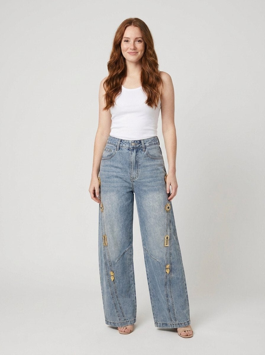 Dazzle wide leg light wash blue denim jeans with gold metallic embroidery, front