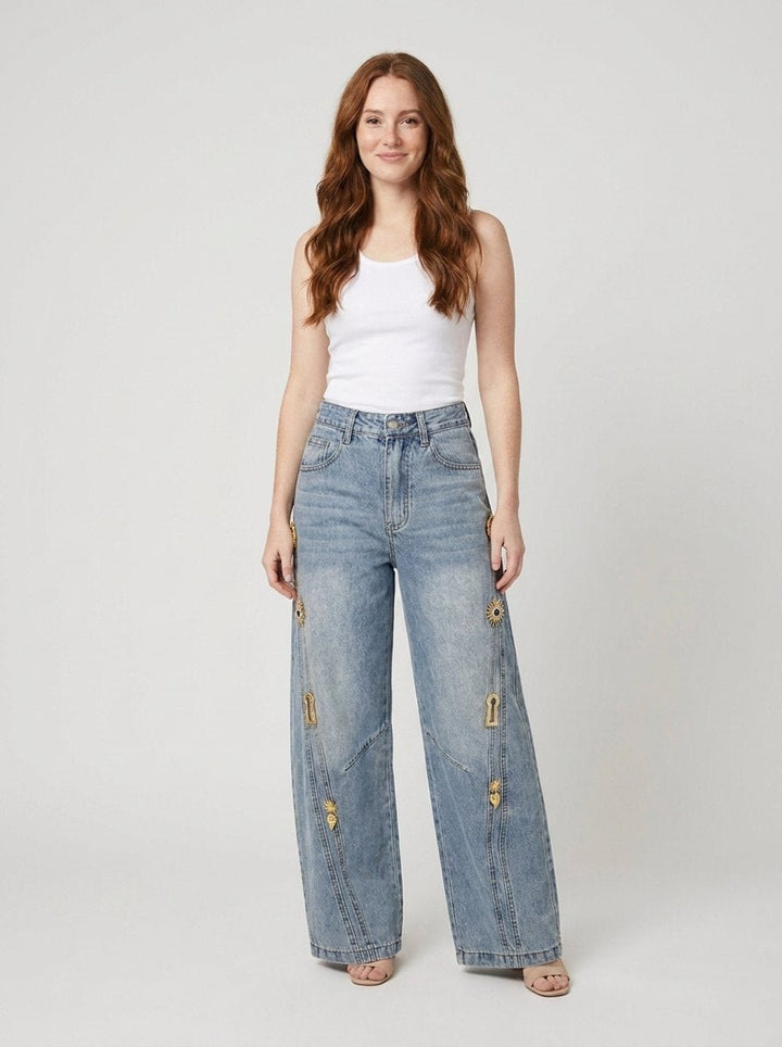 Dazzle wide leg light wash blue denim jeans with gold metallic embroidery, front
