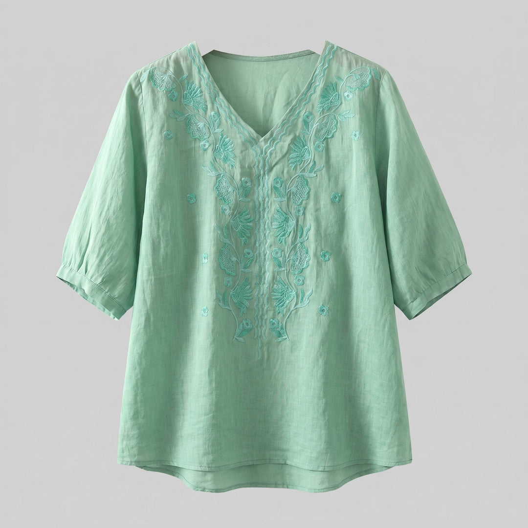 Eloria embroidered linen blouse product flat lay
