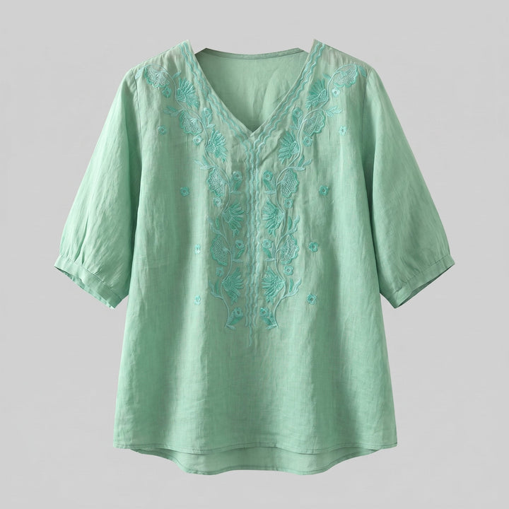 Eloria embroidered linen blouse product flat lay
