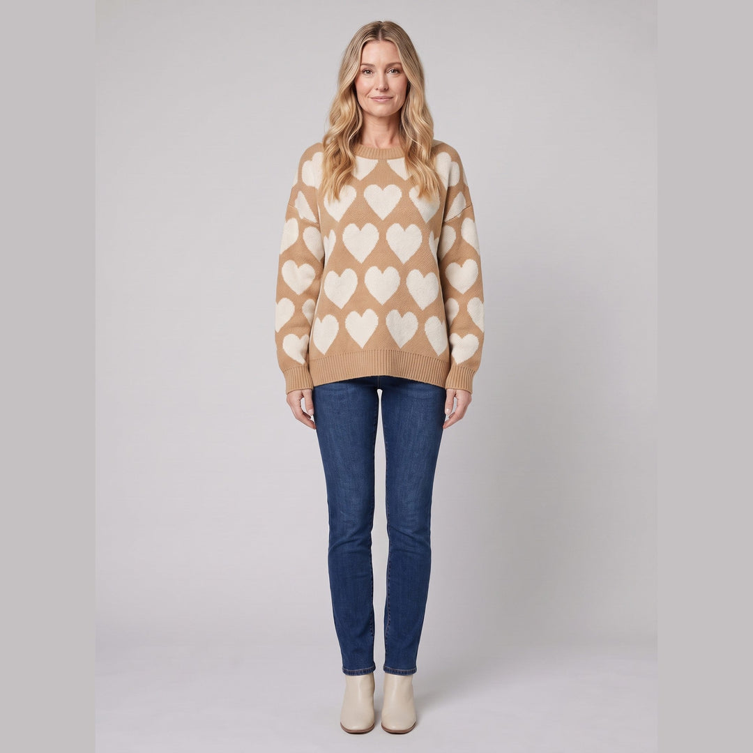Camel heart pattern jumper on model, front view