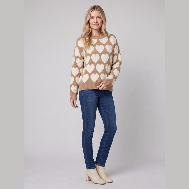 Camel heart pattern jumper, three-quarter pose on model