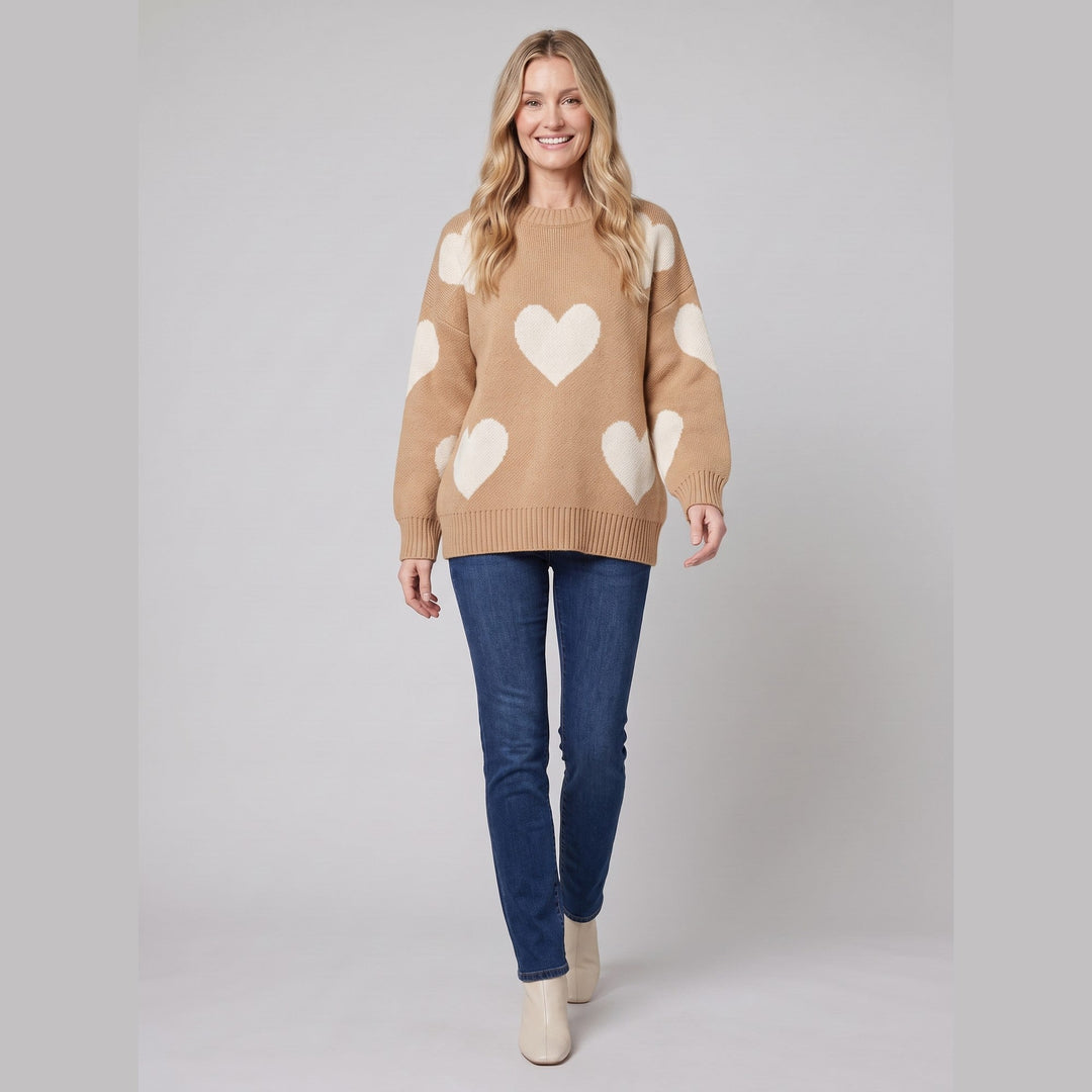 Camel heart pattern jumper, walking pose on model