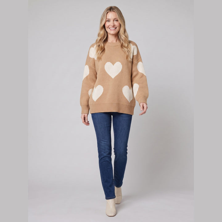 Camel heart pattern jumper, walking pose on model