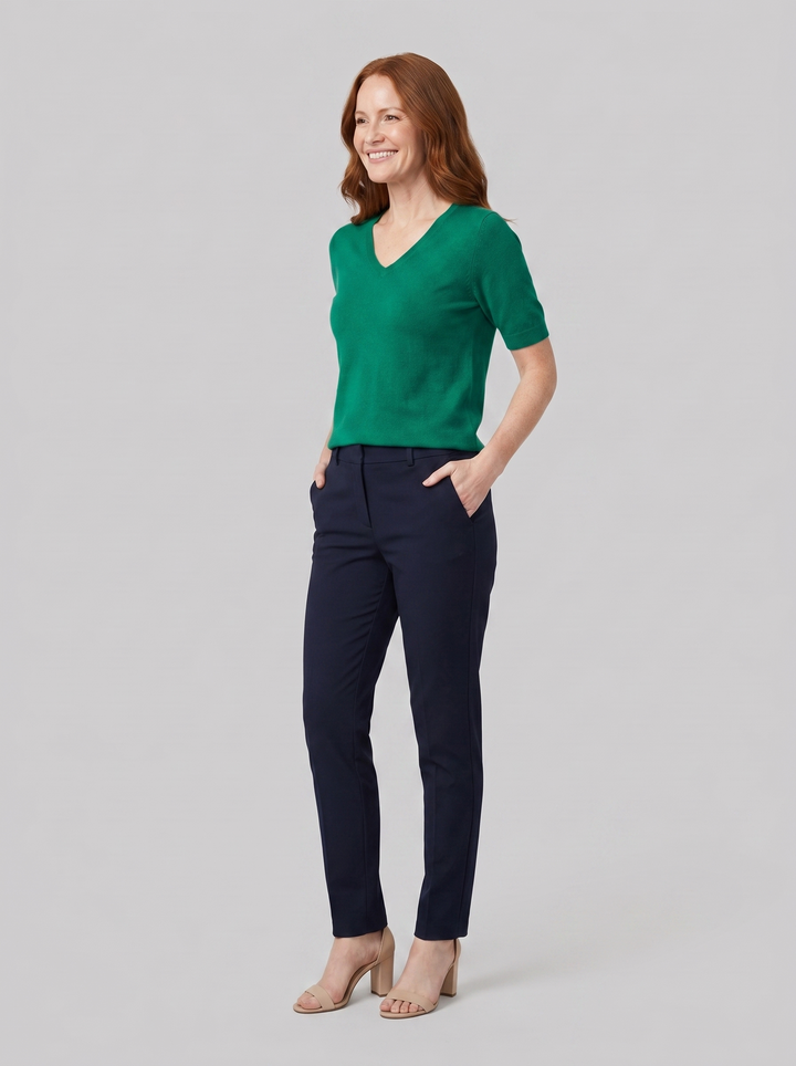 Eulalie wool-blend V-neck knit top in green, worn on model