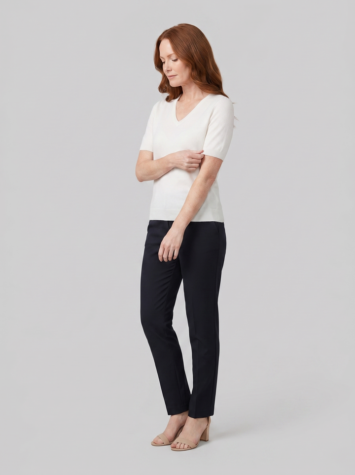 Eulalie wool-blend V-neck knit top in white, worn on model