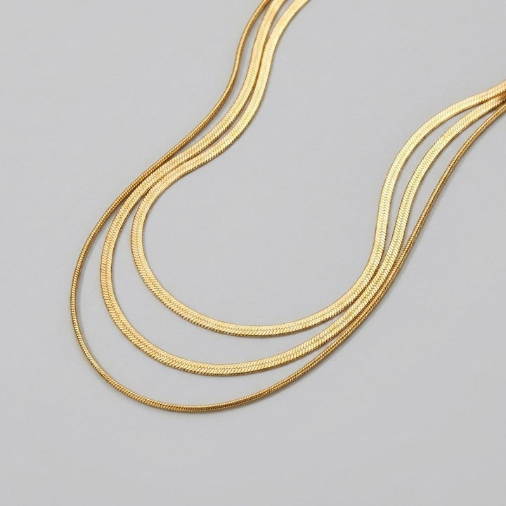 Gold multi layered chain necklace