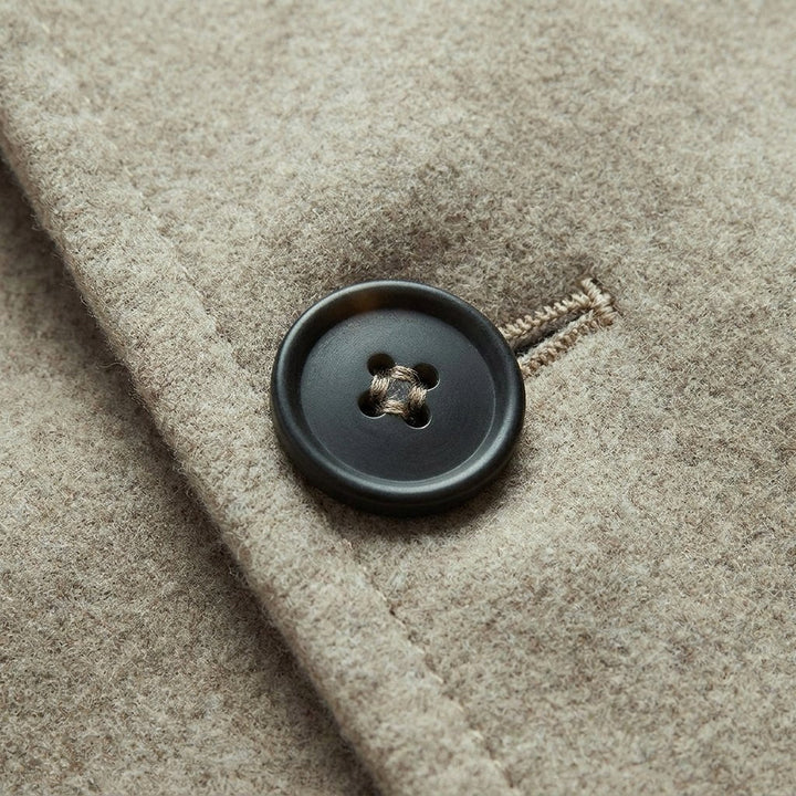Hannah jacket wool fabric and button close-up