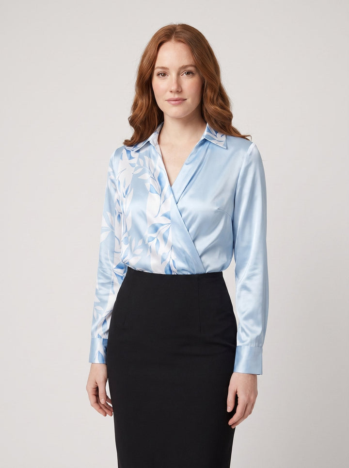 Ikata shiny satin blouse in light blue with floral print