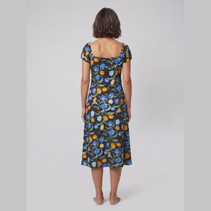 Ivy floral midi dress with square neckline, back view on model