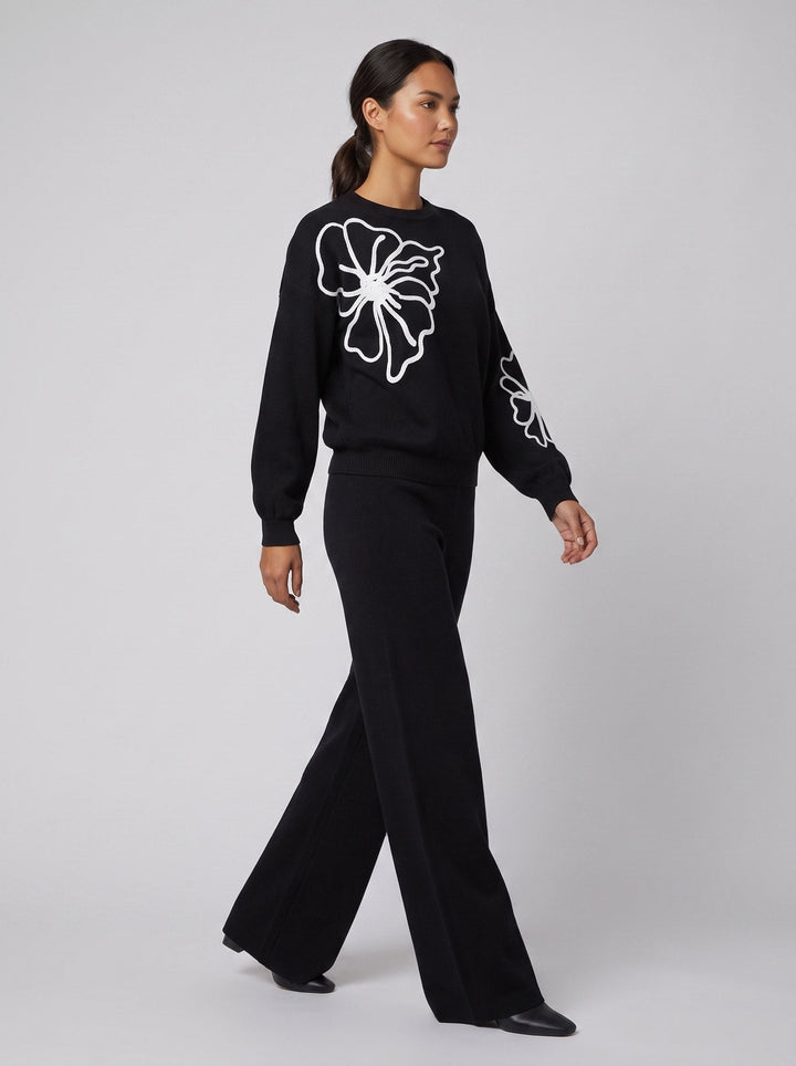 Jenna flower embroidered knit set black - side on model