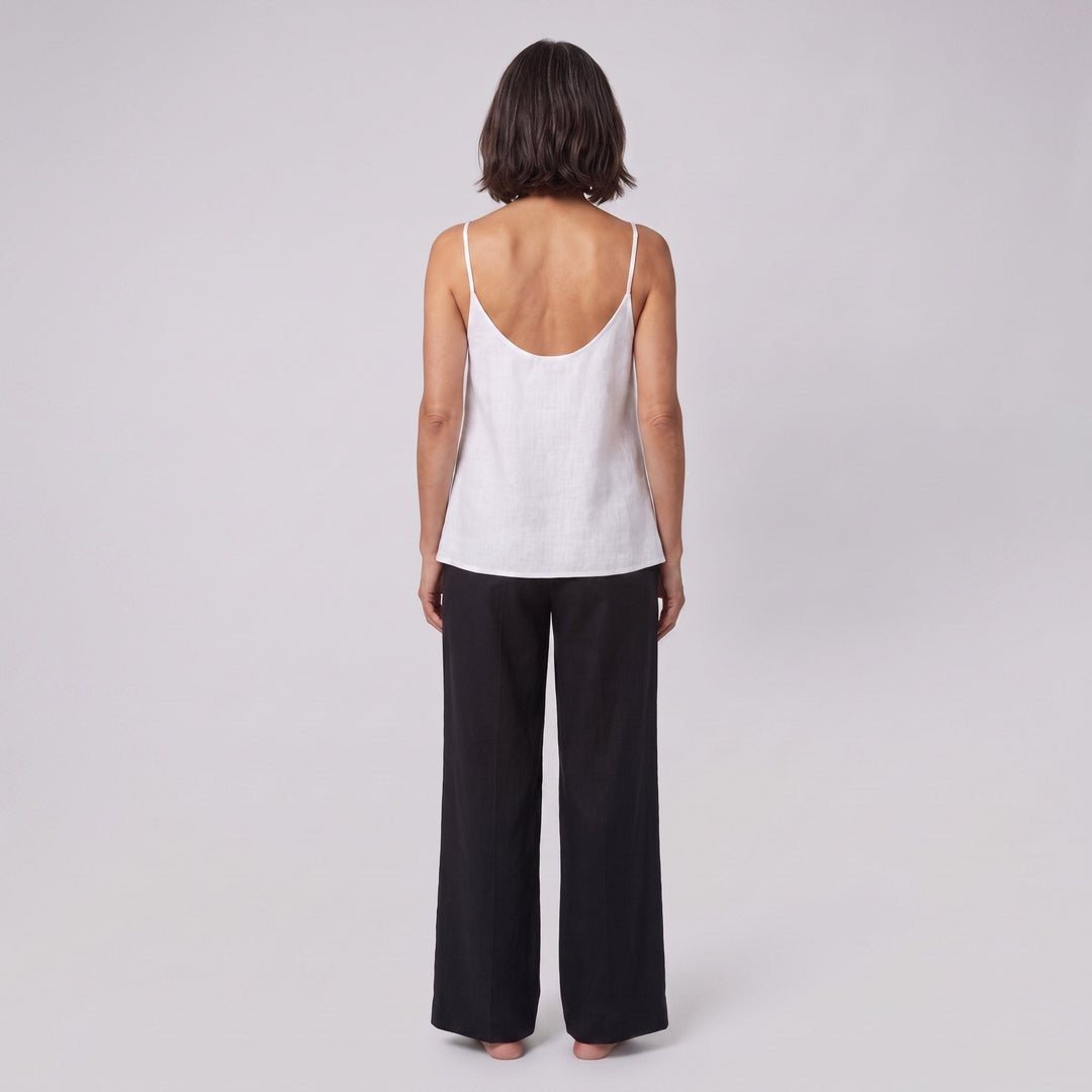 Jess V-neck linen camisole top in white, scooped back view on model