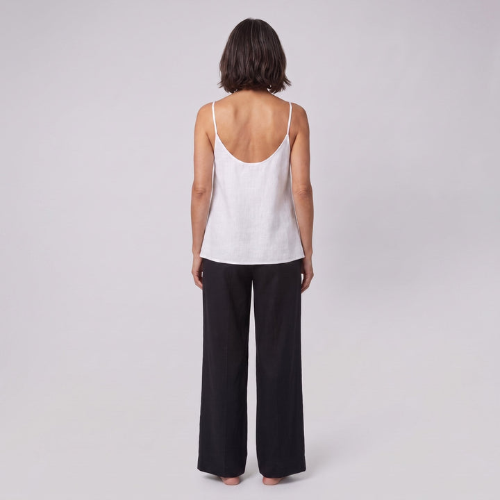 Jess V-neck linen camisole top in white, scooped back view on model