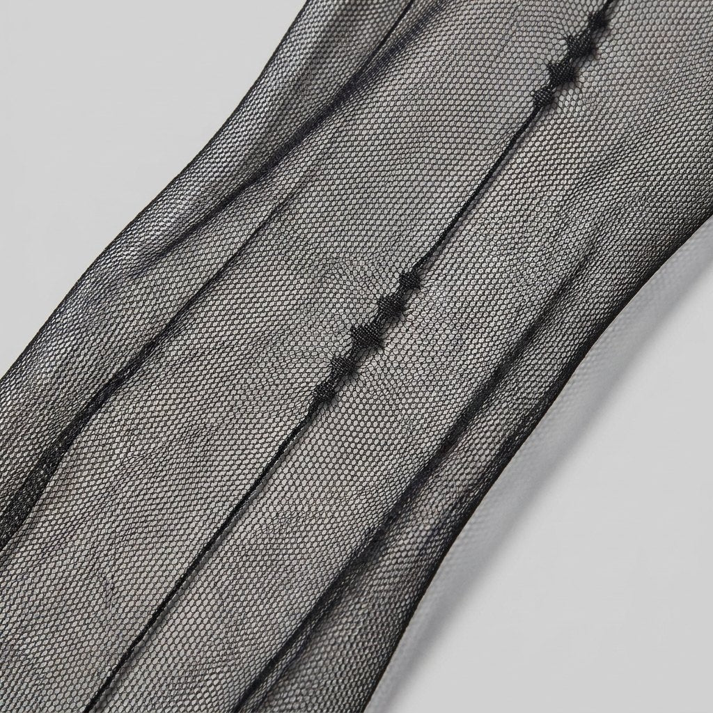 June line sheer tights fabric back-seam close-up