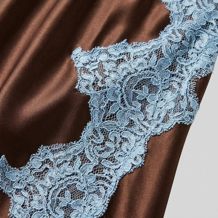 Lace satin and blue lace fabric close-up