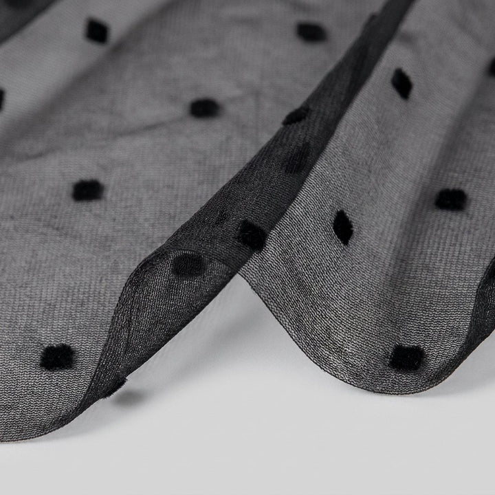 Lia polka dot tights fabric close-up
