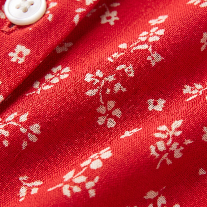 Liora red ditsy floral fabric close-up
