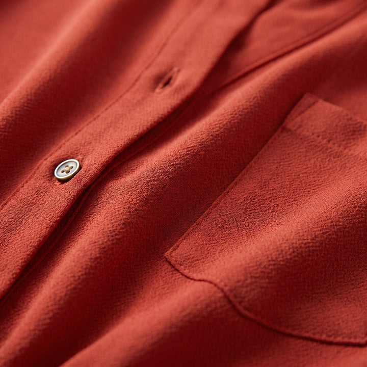 Luna belted romper fabric close-up