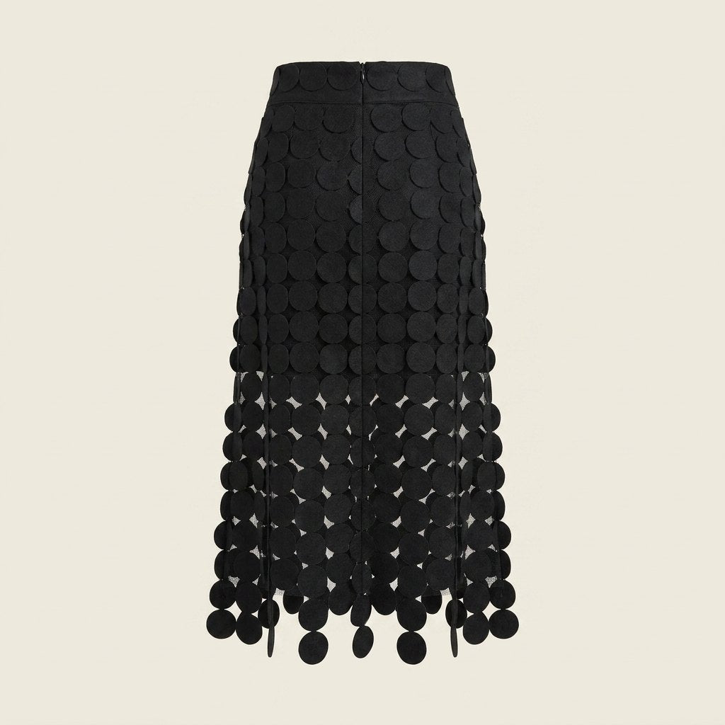 Luna black laser-cut disc midi skirt, back view on model