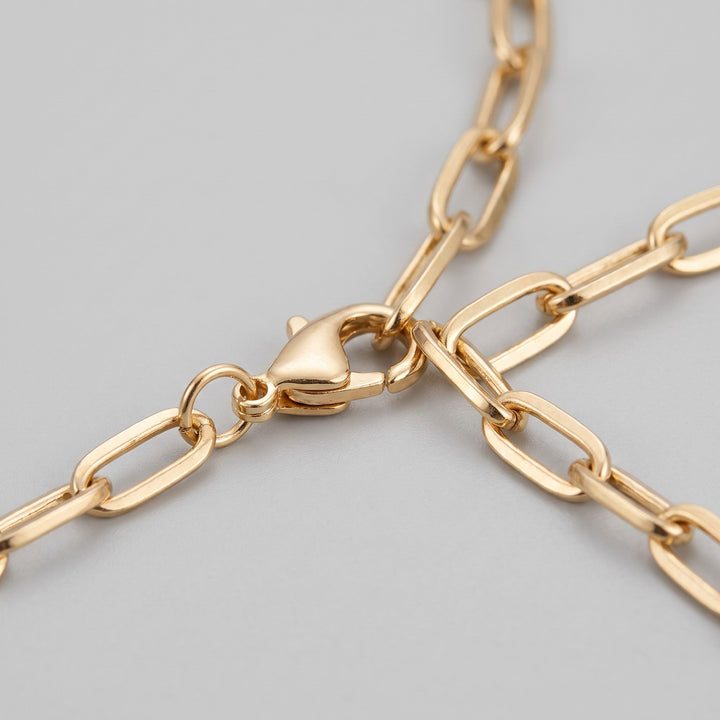 Gold lobster clasp and adjustable extender detail