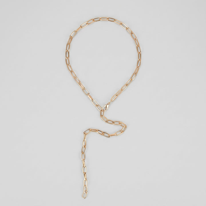 Gold body chain open shape with loop and drop strand
