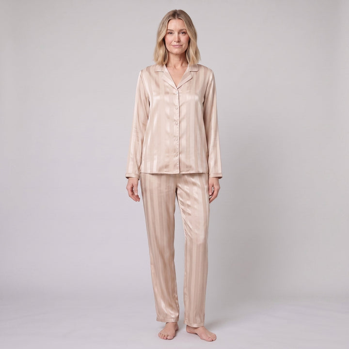 Luxe satin pajama set in champagne beige, relaxed front pose on model