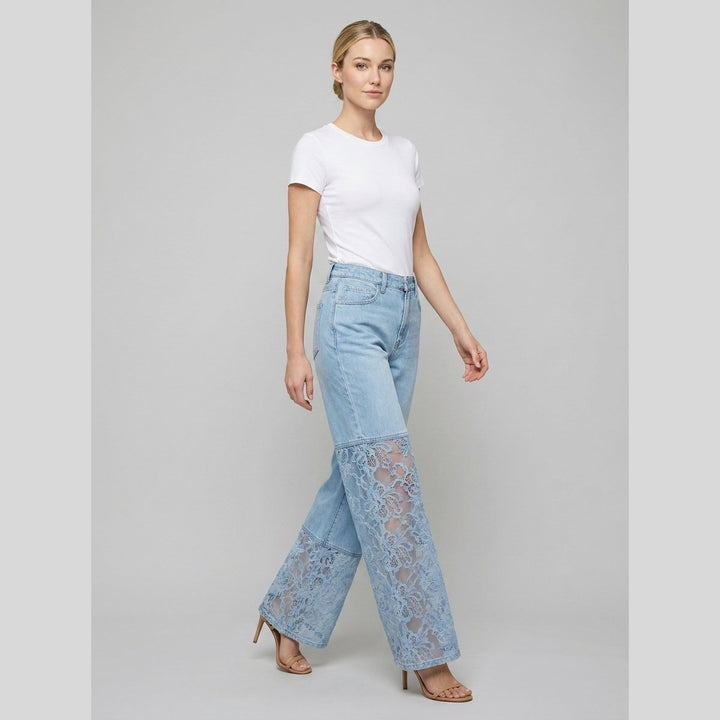 Luxe wide-leg denim jeans with lace inserts, on model walking
