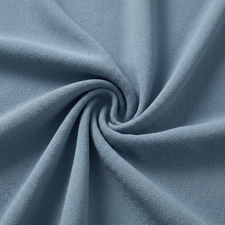 Lyra draped knot jumpsuit crepe fabric close-up in dusty blue