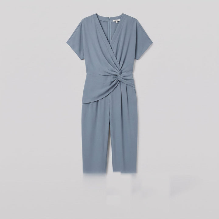 Lyra draped knot jumpsuit in dusty blue, flat product view