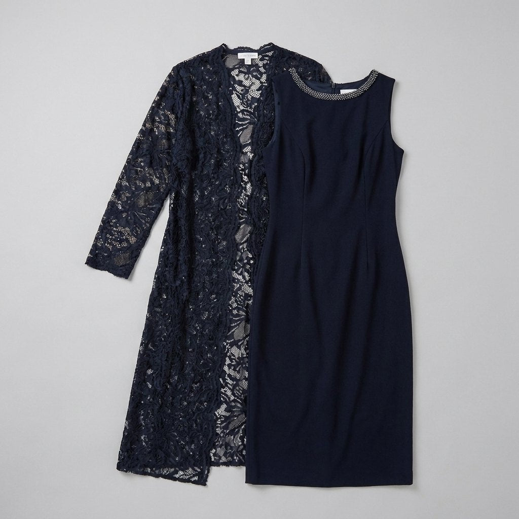 Maya navy sheath dress and lace duster flat lay