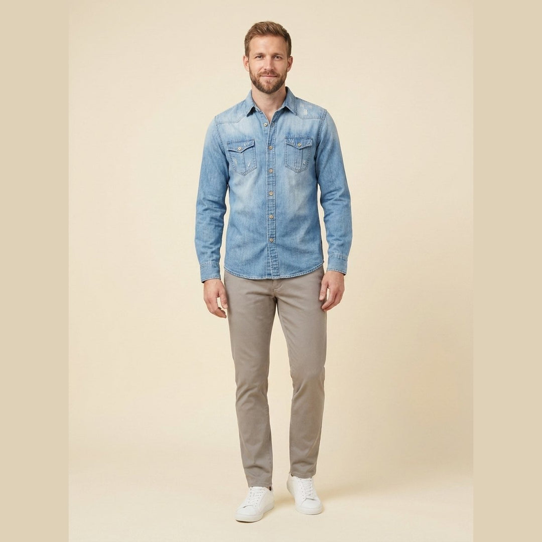 Milo light blue organic cotton denim shirt on male model