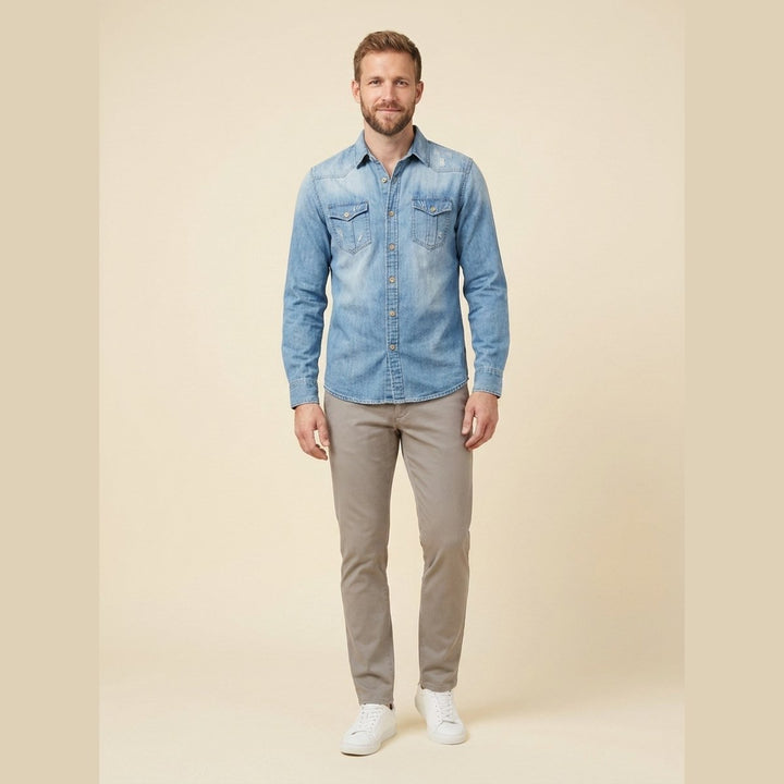 Milo light blue organic cotton denim shirt on male model