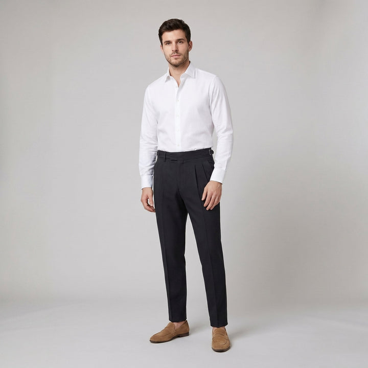 Noble Naples high-waist pleated trousers in black on male model