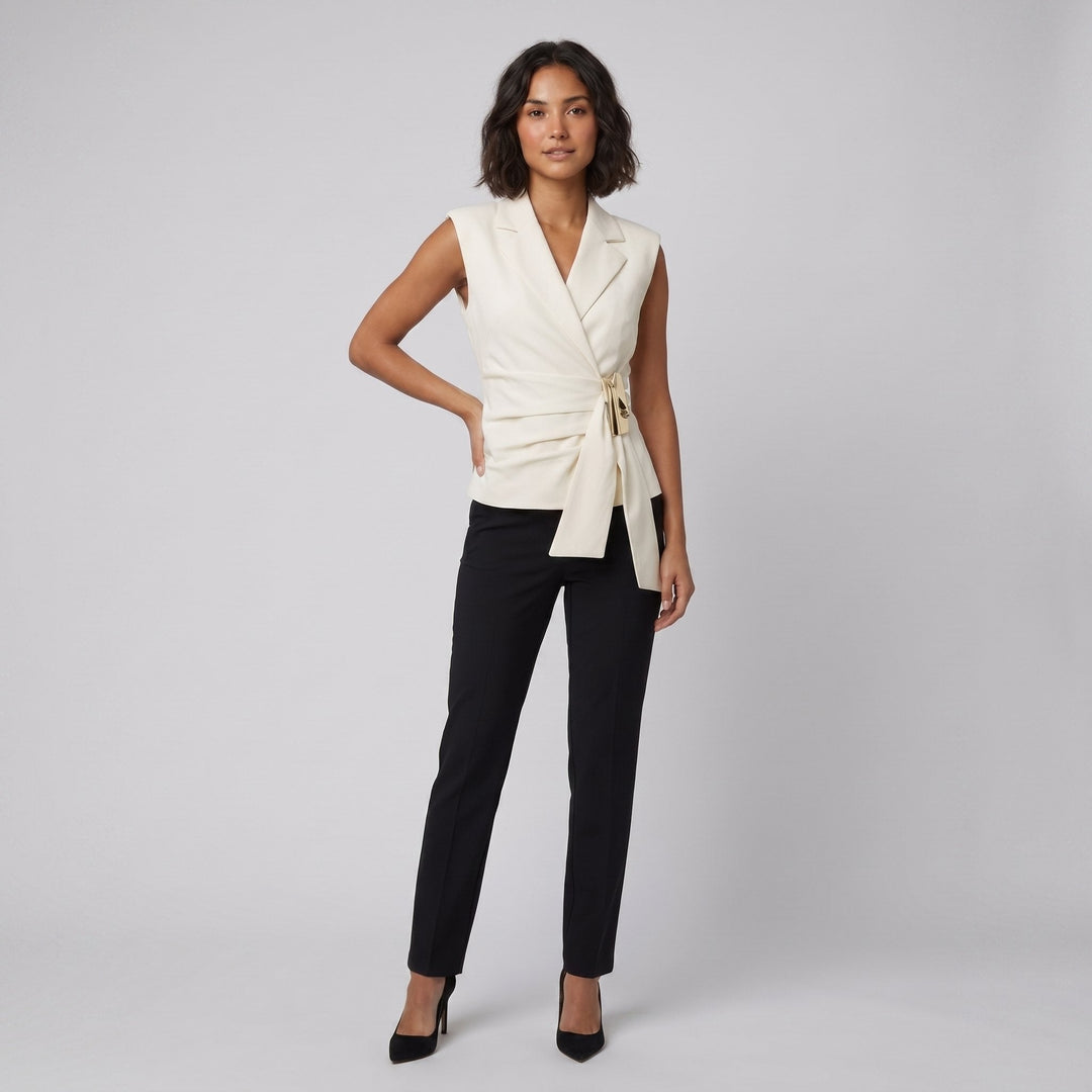 Nora cream ivory tailored wrap vest with gold clasp on female model