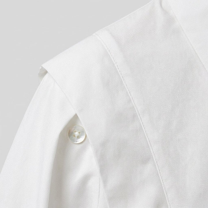 Oasis shirt button and structured shoulder fabric detail