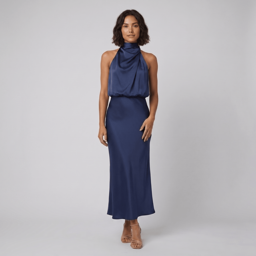 Ombline floor-length satin halter gown in navy blue, on model