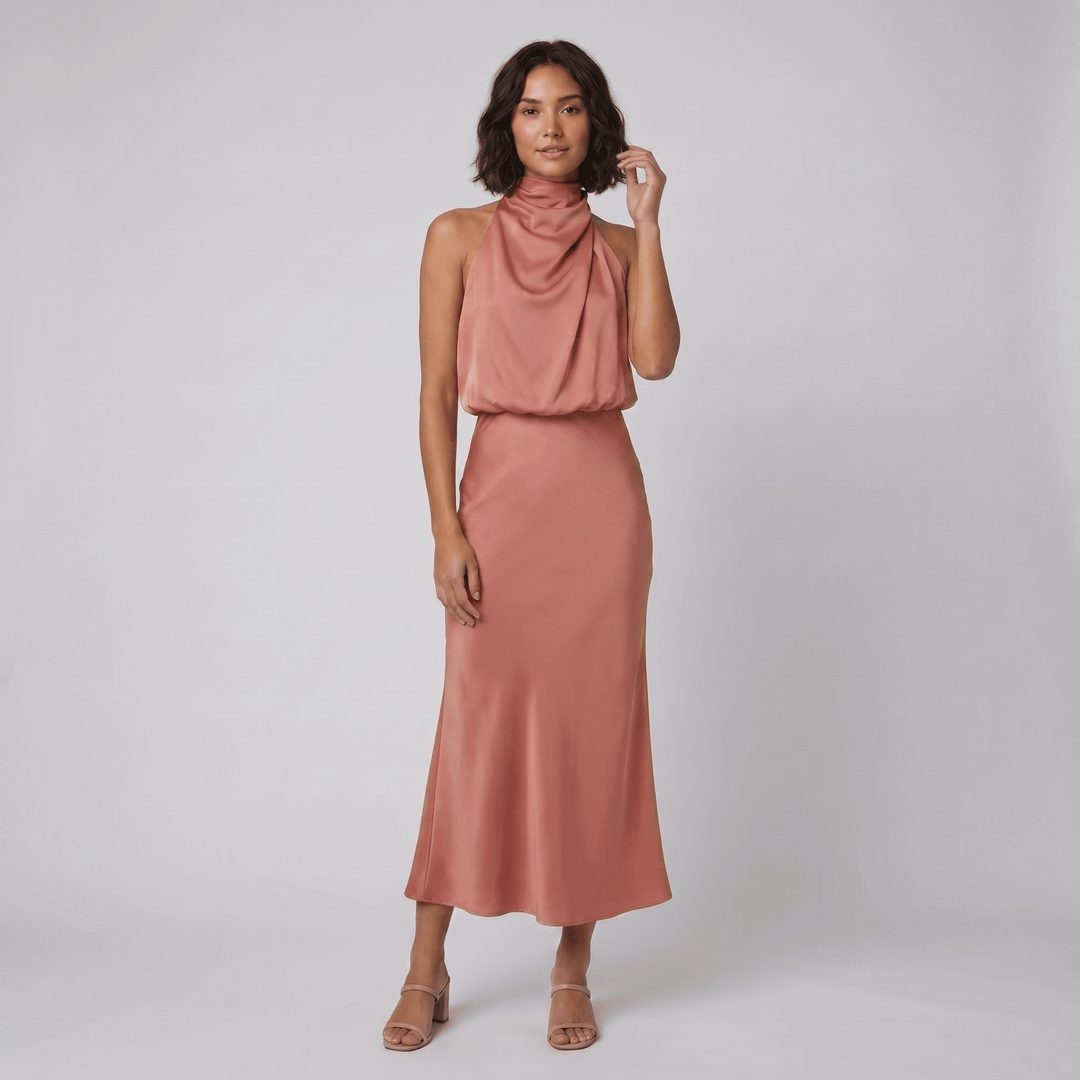 Ombline floor-length satin halter gown in salmon, on model