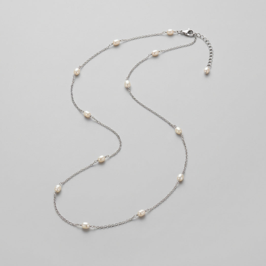Ivory pearl body chain, full piece laid flat
