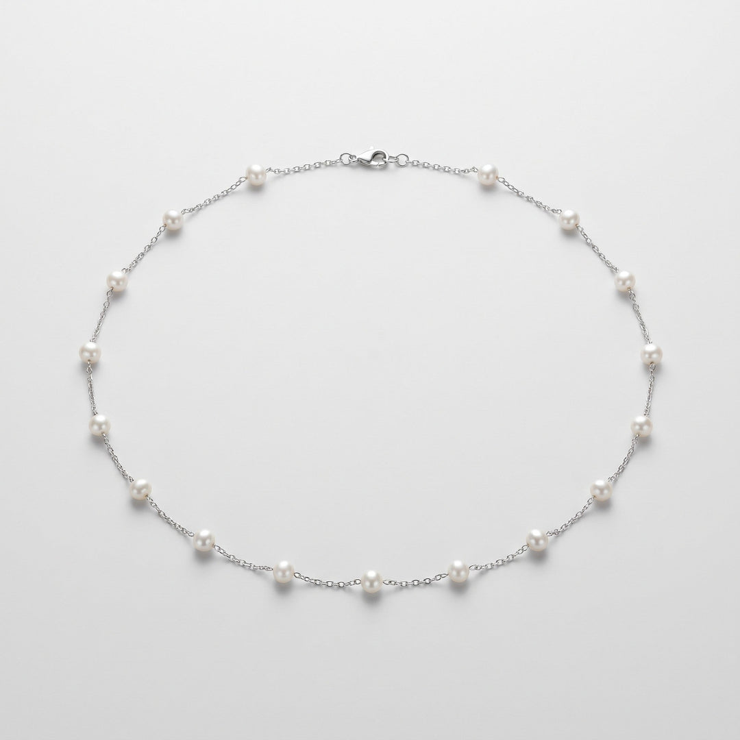 Ivory pearl body chain in open loop, complete piece