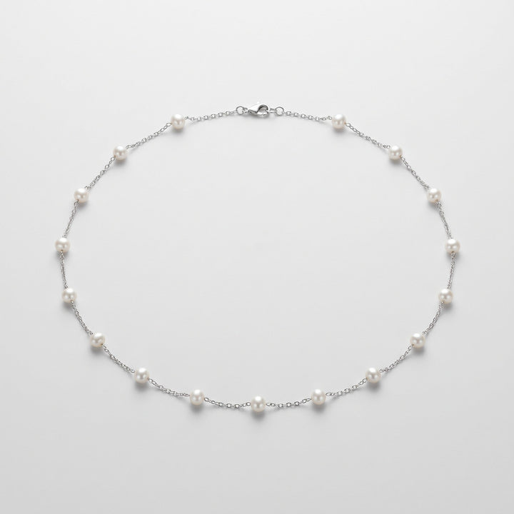 Ivory pearl body chain in open loop, complete piece