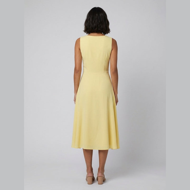 Raffi yellow midi dress back view on model