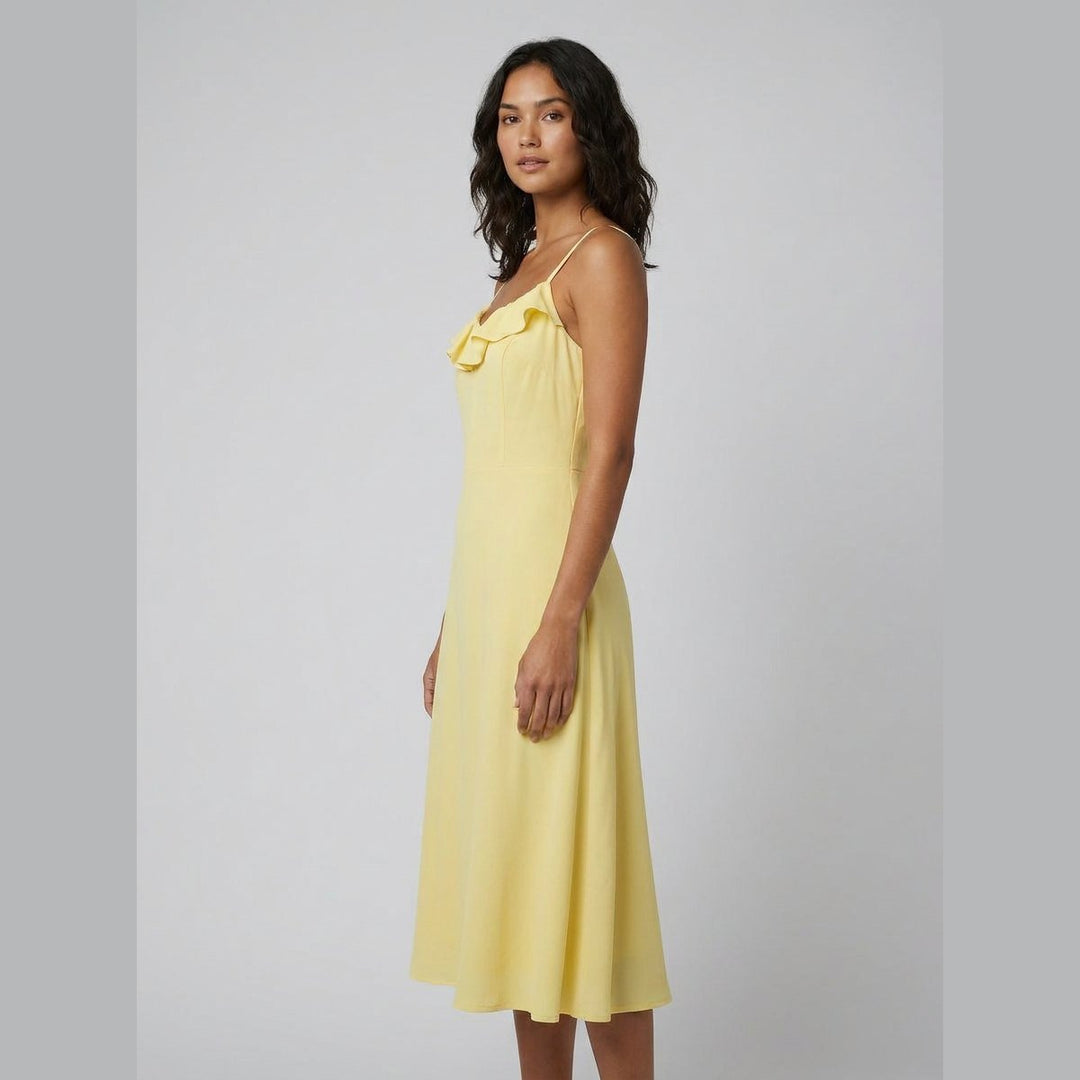 Raffi yellow midi dress three-quarter side view on model