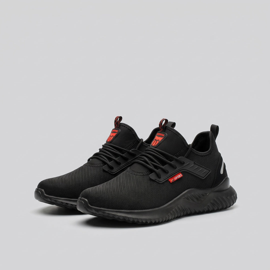 Black safety work shoe, three-quarter front view of the pair