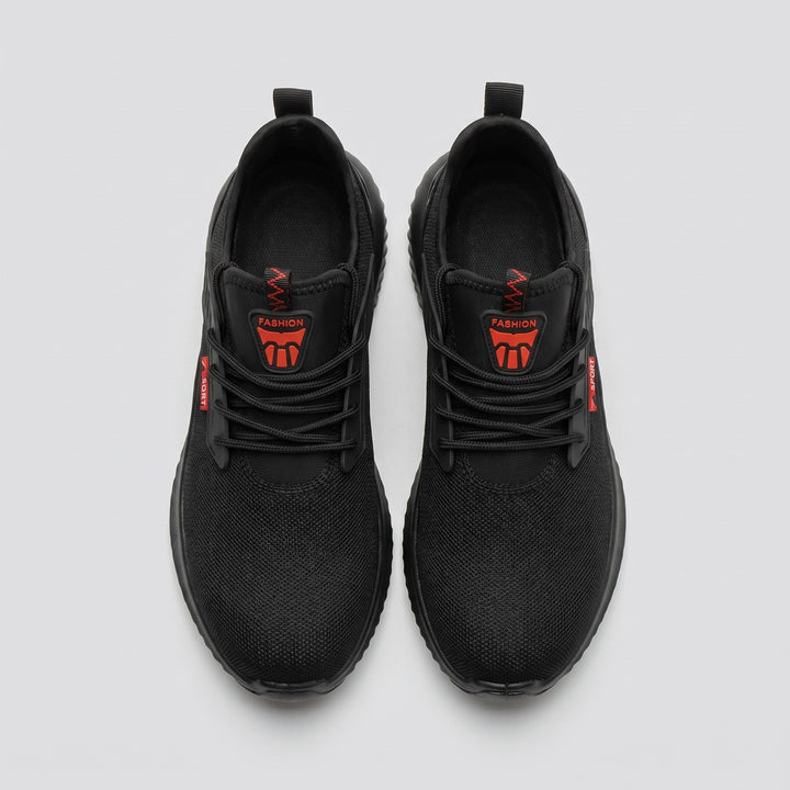 Black safety work shoe, top view showing mesh upper and lacing