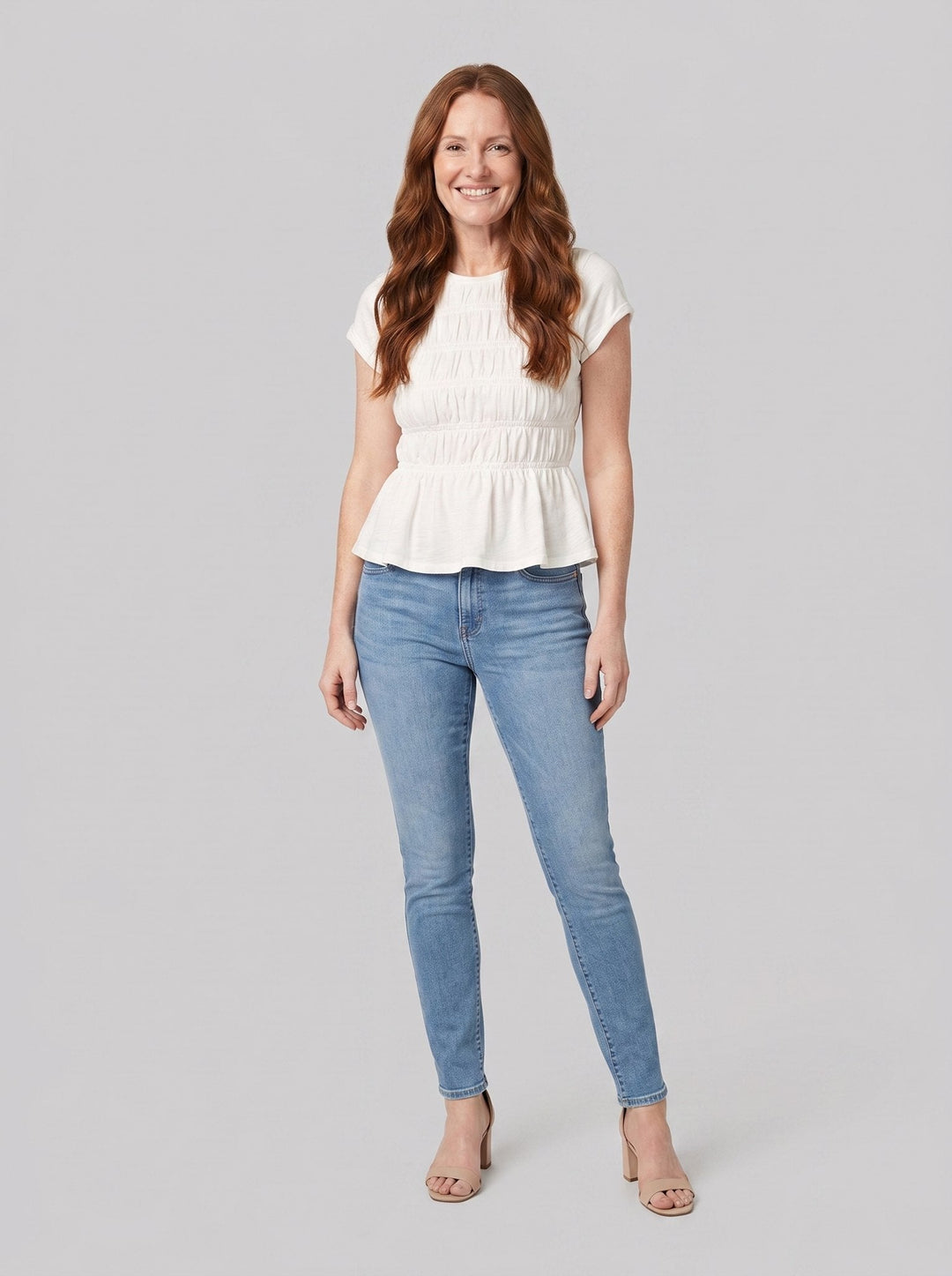 Rita ruffle top in white, front view